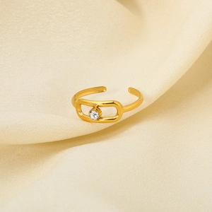 Detail of 18K gold plated stainless steel ring with rectangular frame and zircon stone
