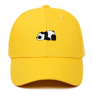 Close-up of a yellow cotton baseball cap featuring detailed panda embroidery on the front