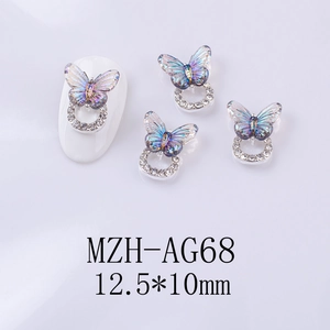 Detailed view of laser aurora butterfly nail charms with rhinestones sized 12.5x10mm