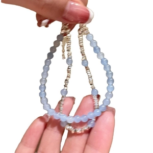 Bracelet en perles d'aigue-marine avec tubes en argent au style minimaliste élégant