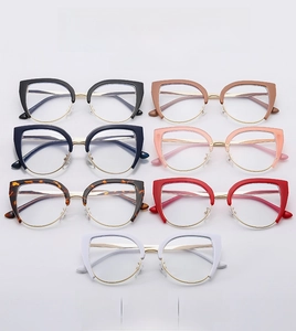 Collection of retro cat-eye metal half-frame glasses in seven assorted colors and gold temples