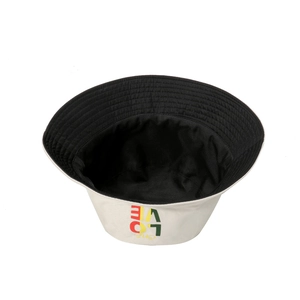 Detail of the reversible bucket hat showing white canvas fabric and One Love embroidery