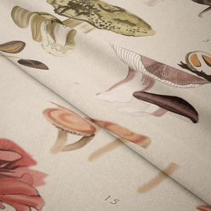 Detail of soft beige fabric featuring vintage mushroom illustrations and textured weave
