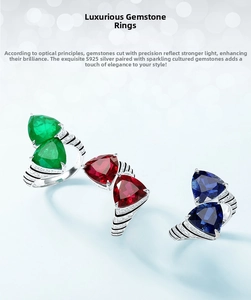 Macro detail of S925 silver trillion cut rings with emerald, ruby and sapphire stones
