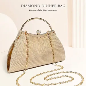 Elegant champagne gold pleated evening bag with round metal handle and diamond buckle