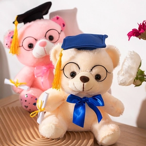 Cute graduation teddy bears with doctoral hats and glasses in pink and cream plush