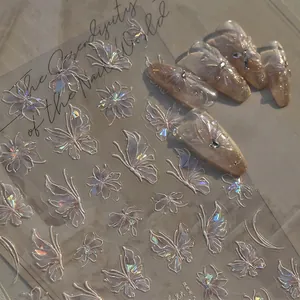 Iridescent butterfly nail stickers with a shell-like holographic finish on nude base