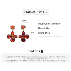 Detail showing dimensions and material specs for vintage red flower drop earrings