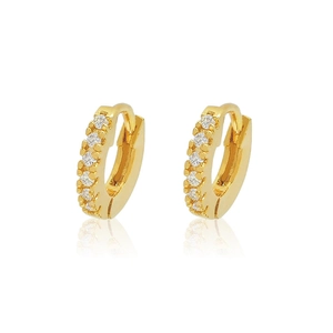 Detail of 24K gold-plated huggie earrings with shimmering micro-pave cubic zirconia