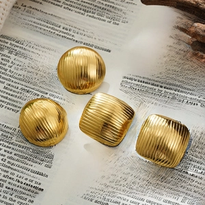 18K gold plated geometric striped earrings on vintage book, round and square studs