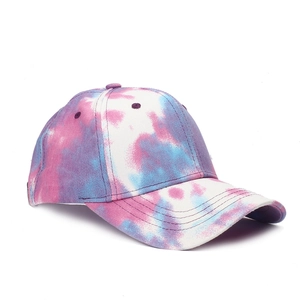 Detailed view of the pink and blue tie-dye cotton baseball cap with six-panel structure