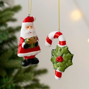 Christmas ceramic Santa Claus and candy cane tree ornaments with golden strings