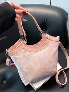 Elegant pink floral embroidered tote bag with leather handles and adjustable shoulder strap