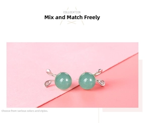 Detail view of S925 silver rabbit earrings featuring green jadeite beads and zircon accents