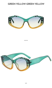 Close-up of geometric cat-eye sunglasses with green leopard print and gradient lenses