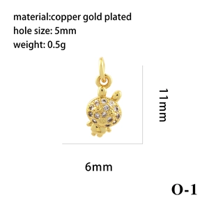 Macro detail of gold plated bunny charm with zircon inlay for DIY necklace making