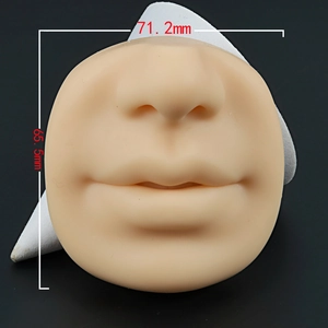 Silicone nose and mouth model with measurements of 71.2mm by 65.5mm for piercing practice