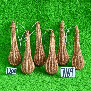 Detail of 6pcs 12cm glittered teardrop ornaments with metallic gold sequin finish