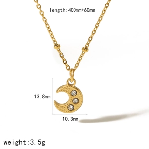Detail view of a gold-plated crescent moon necklace with zircon stones and dimensions