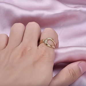 Minimalist 304 stainless steel open ring with a hollow water-drop design in gold finish