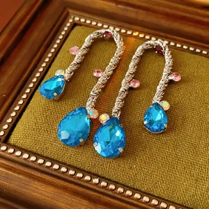 Vintage silver drop earrings with braided metal textures and colorful waterdrop crystals