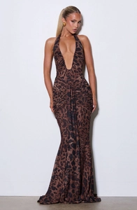 Close-up of leopard print maxi dress featuring deep V-neckline and waist pleating detail