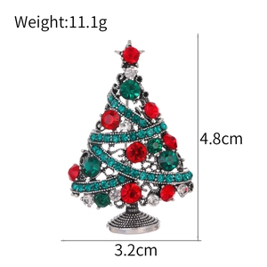 Sparkling silver Christmas tree brooch with red and green rhinestones and size details