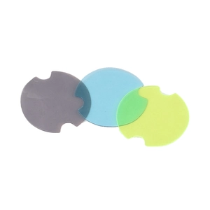 Three-piece set of purple, blue, and green translucent car coasters with notch design