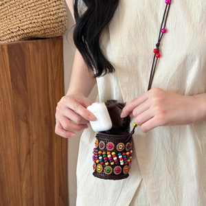 Bohemian handmade woven crossbody bag for earphones with colorful bead decorations