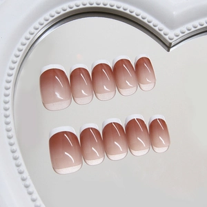 Elegant sand red gradient ombre press-on nails with white French tips and cat eye shine