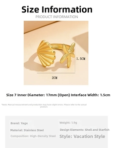 Detail view of 17mm gold stainless steel ring with starfish and shell seaside motifs
