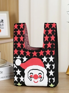 Knitted Christmas tote bag featuring Santa Claus pattern and festive stars on black fabric