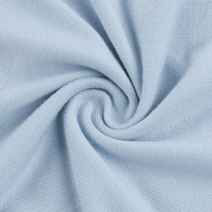 Close-up of light blue ribbed knit fabric showing elastic texture and soft drape