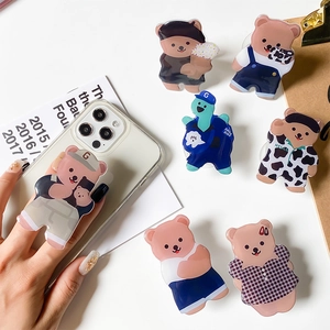 Cute cartoon bear and dinosaur expandable phone socket stands in various designs