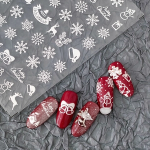 5D embossed Christmas nail stickers featuring white snowflakes and elk on deep grey background