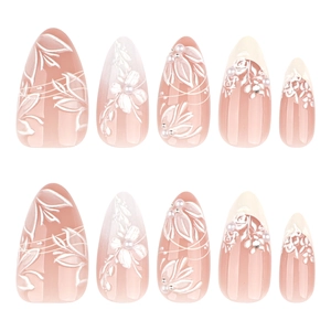 Elegant almond press-on nails in nude pink with 3D white floral patterns and pearls
