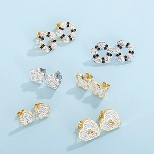 Detailed set of crystal-studded butterfly, flower, and heart earrings in gold and silver