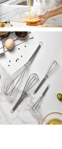 Detailed set of 4 stainless steel spring handle whisks for kitchen mixing and baking
