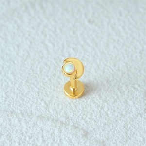 Detailed view of s925 silver moon stud earring with opal inlay and gold finish