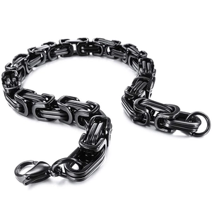 Detail of black Byzantine link chain in stainless steel with durable lobster clasp closure