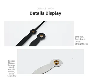 Macro detail of quartz clock hands with gold copper bushings and smooth metal finish