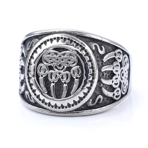 Vintage Viking stainless steel ring featuring a detailed bear claw relief design with aged finish