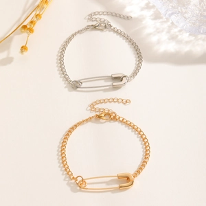 Detailed view of creative paperclip necklaces in silver and gold finishes with lobster clasp