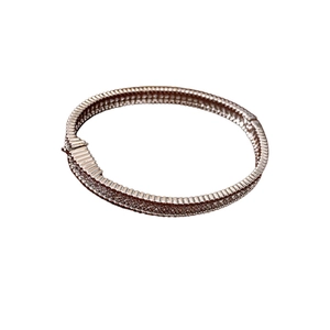 Minimalist rose gold bracelet with zircon pavé setting and secure clasp closure