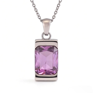 Macro detail of rectangle purple emerald-cut gemstone in a silver stainless steel setting