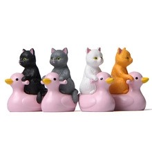 Four colorful miniature cats riding pink ducks, decorative resin animal figurines