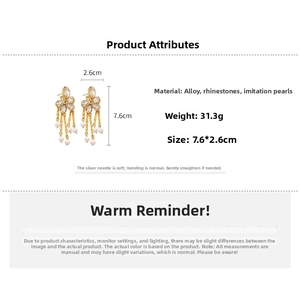 Detailed size chart for floral tassel earrings with dimensions 7.6cm by 2.6cm