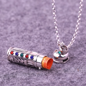 Nepalese vintage silver cylinder mantra pendant with colorful gems and sutra scroll