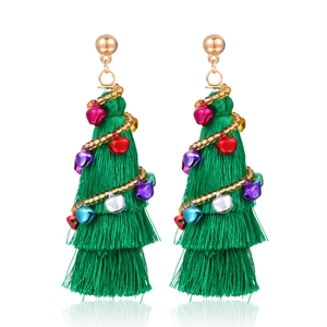 Detail of Christmas tree tassel earrings with colorful metal bells and golden beads