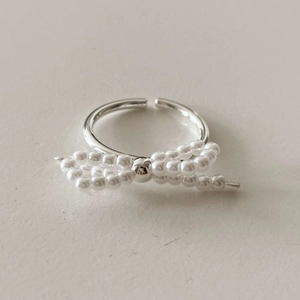 925 silver bow ring with white pearl accents and adjustable open band for women